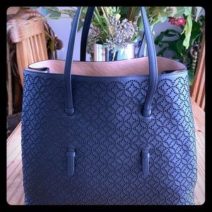 ALAÏA
Mina Arabesque Studded Leather Tote Purse